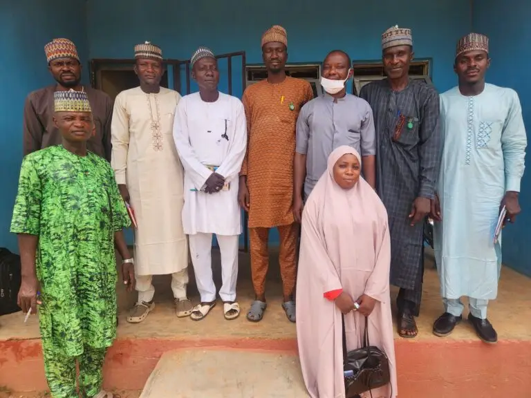LHAAT members and Soba local government officials standing together in an office in Soba, Kaduna