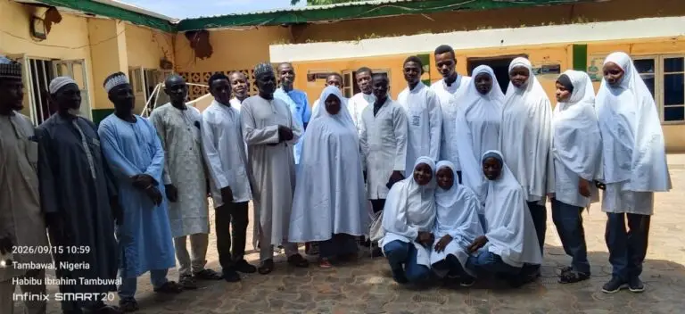 A large group of community members and LHAAT members outside a primary health centre in Tambuwal, Sokoto